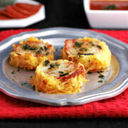 Three spaghetti squash nests with tomato suce, cheese and pepperoni.
