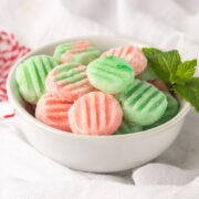A bowl of pink & green mints.