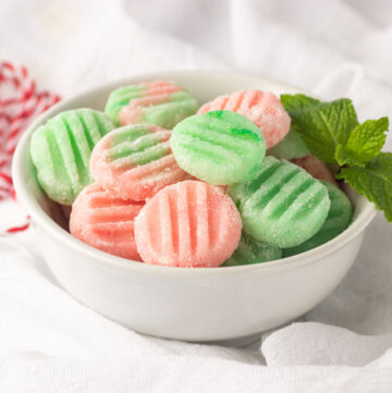 A bowl of pink & green mints.