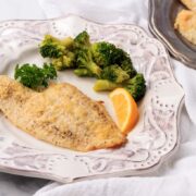 keto parmesan breaded crusted fish with broccoli.