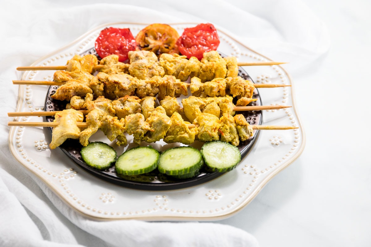 Grilled chicken skewers with a lemon butter saffron marinade and sauce