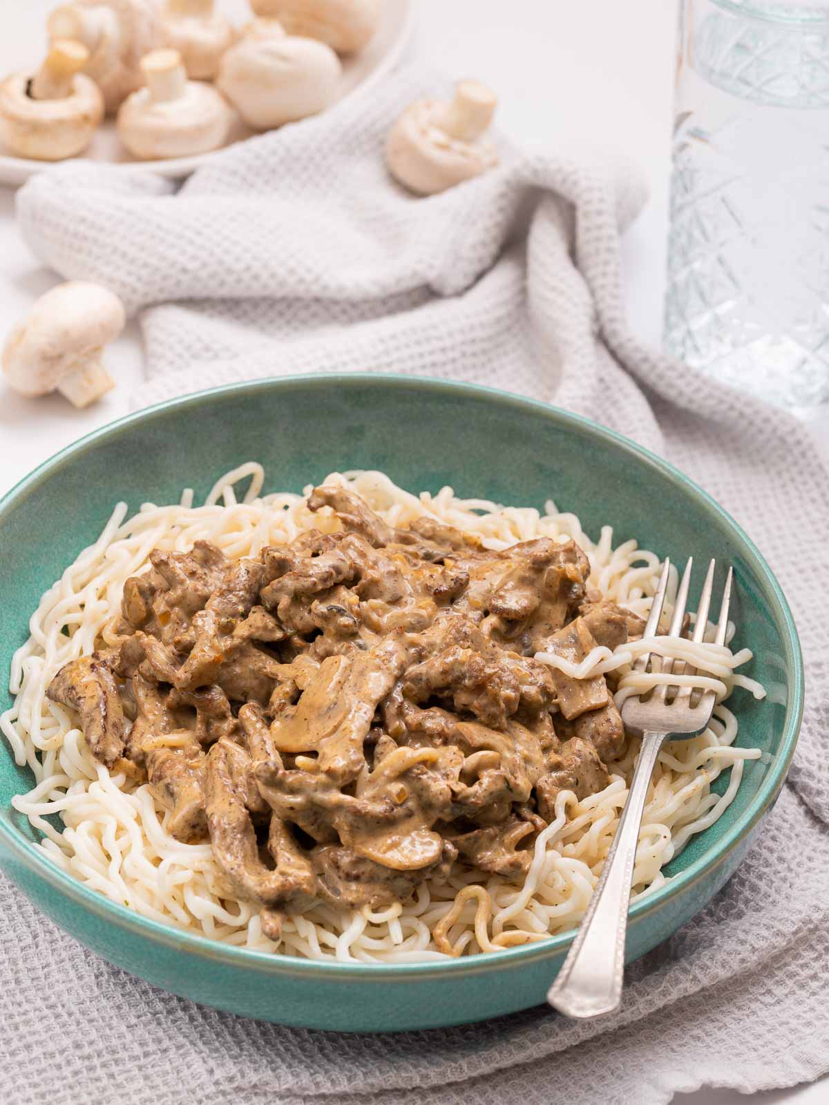 Noodles, mushrooms and beef strips in a creamy sauce.