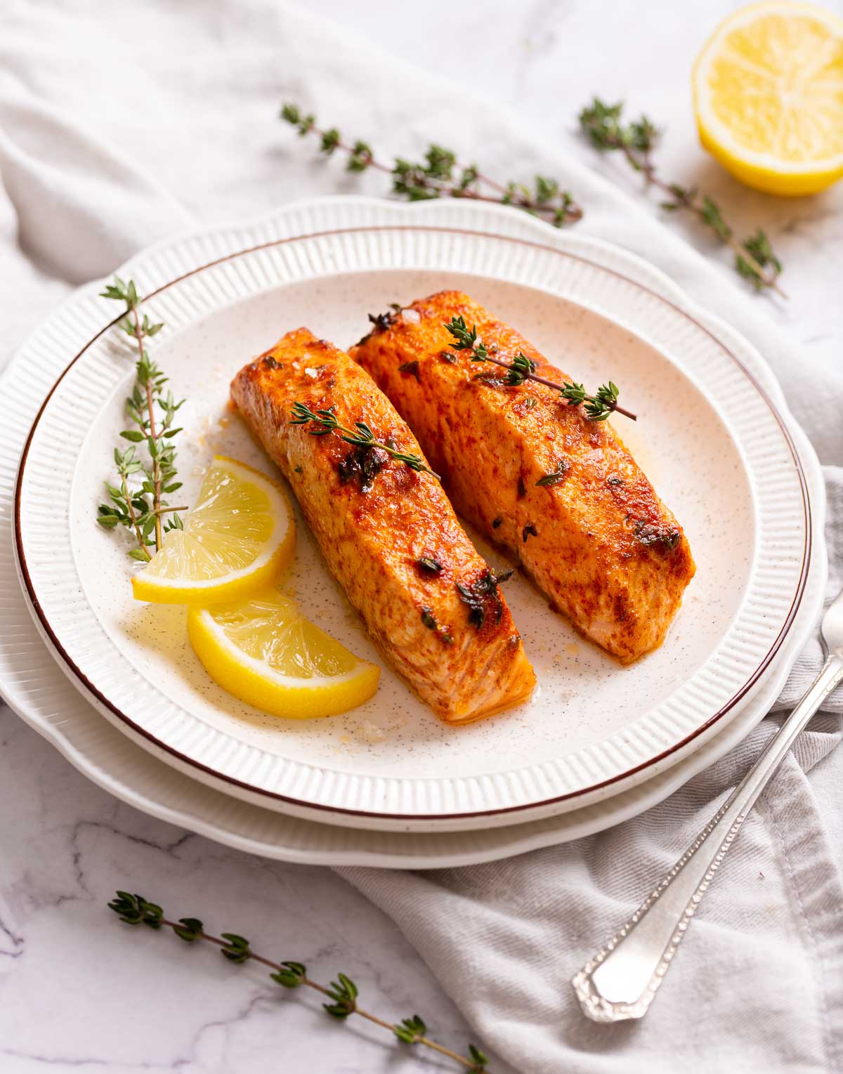 Keto Air Fryer salmon brushed with a seasoning oil.