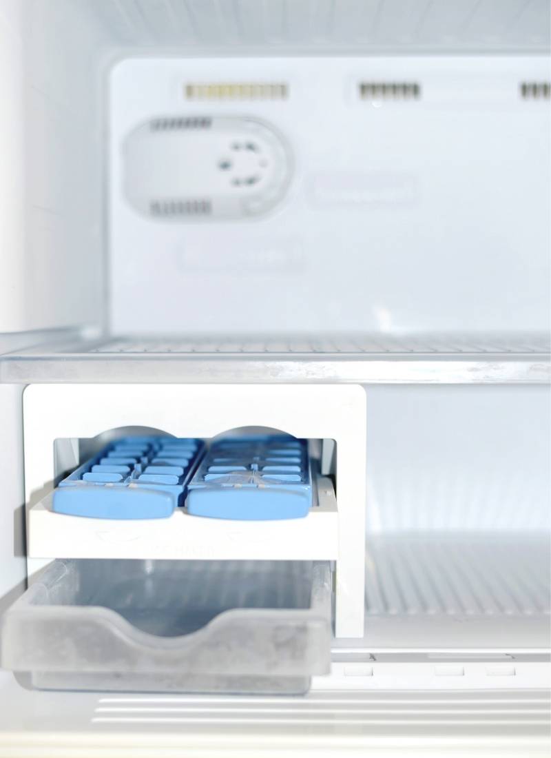 Placing cheese sticks in the freezer