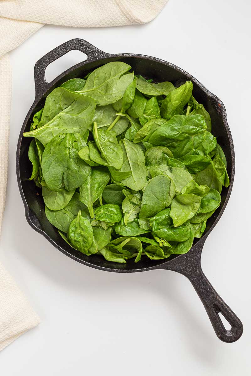 Cooking the spinach.