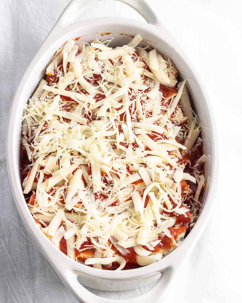 Add remaining cheeses to the dish.