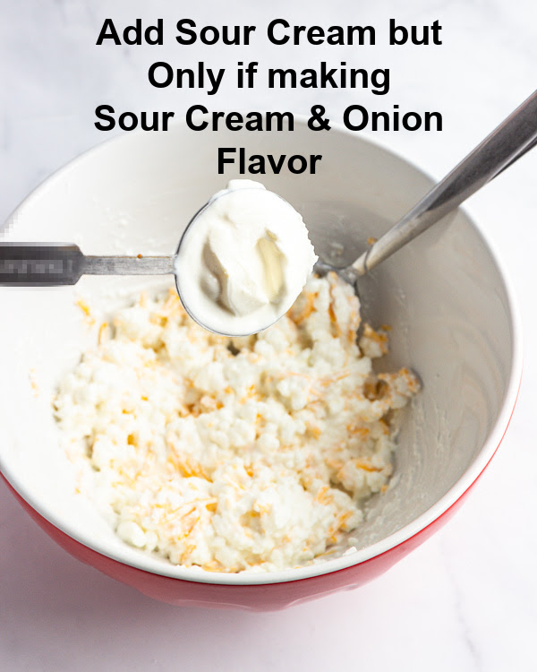 Adding optional sour cream.