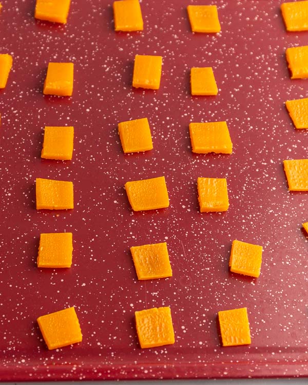 Blotting the cheese.