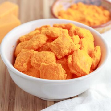 A bowl of homemade keto crunchy cheese puffs.
