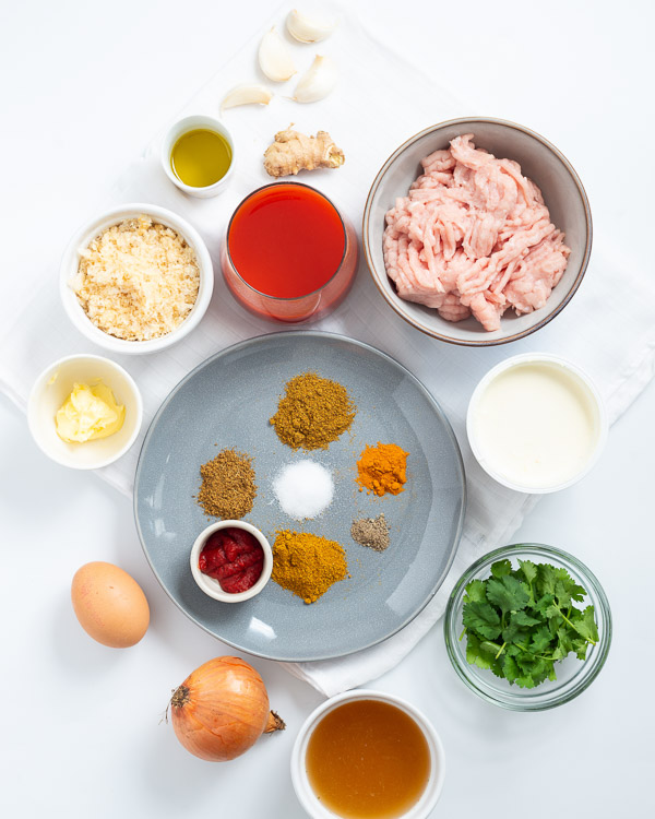 The ingredients to make keto butter chicken meatballs.