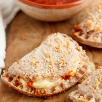 Easy keto pizza pockets filled with sauce and cheese.