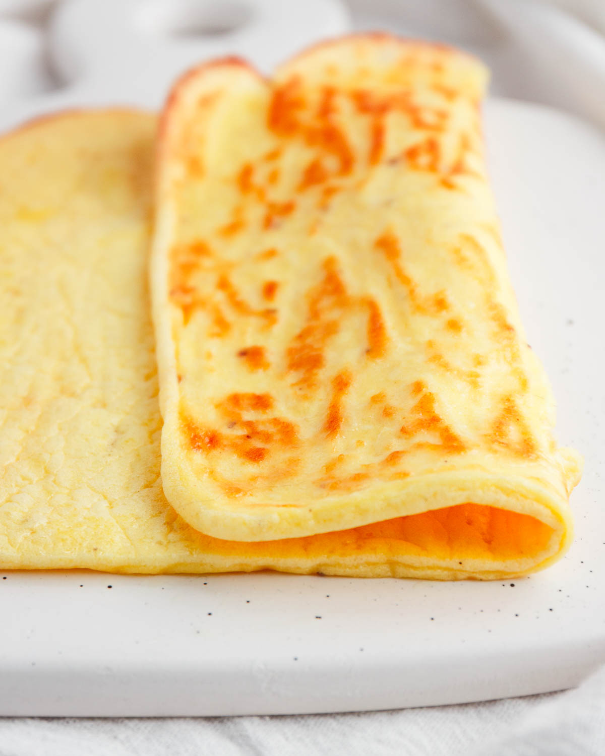 A sheet of bake keto cottage cheese parmesan flatbread.