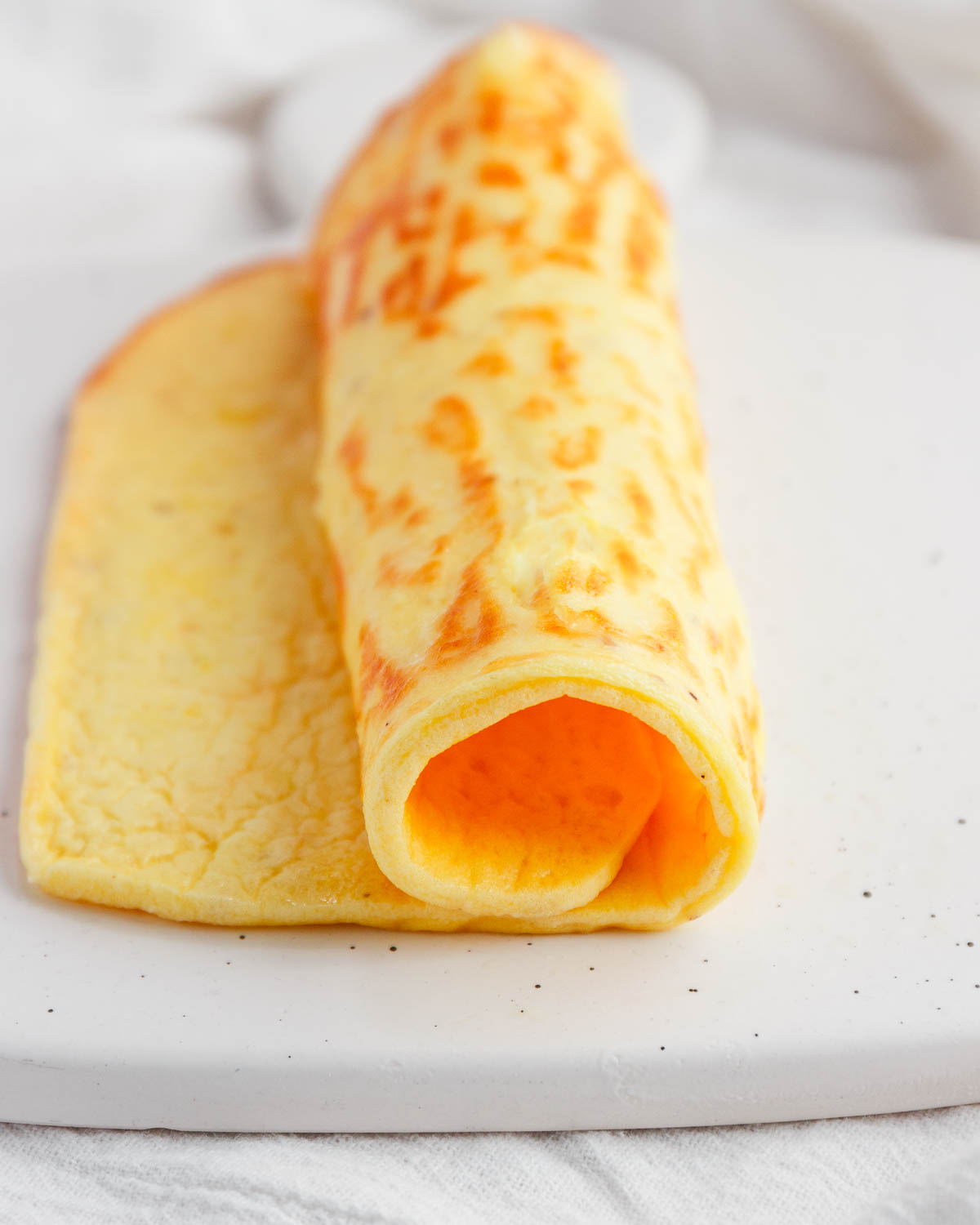 A sheet of bake keto cottage cheese parmesan flatbread.