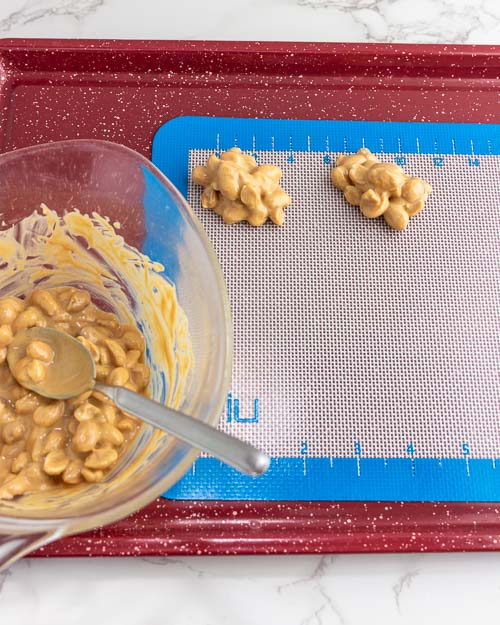 Spooning clusters onto the baking sheet.