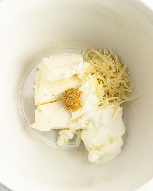 Mixing the cream sauce.