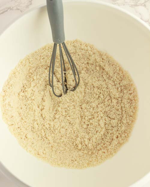 Mixing the dry ingredients fordonut holes.