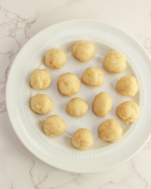 Making the keto donut holes.