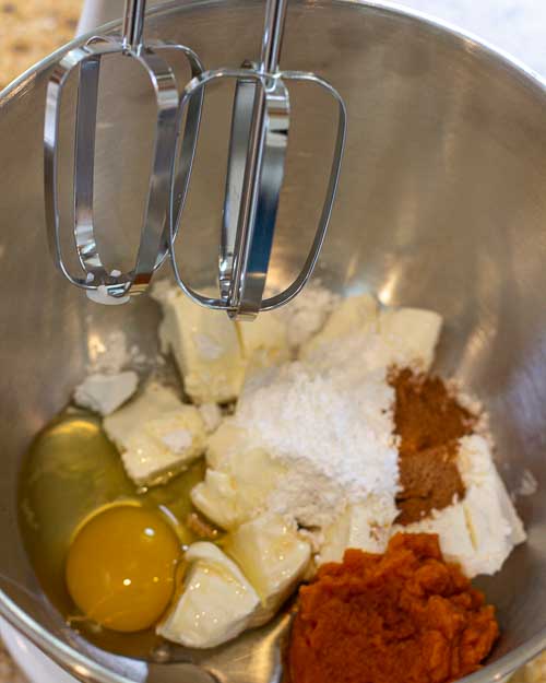 Mixing the cheesecake batter.