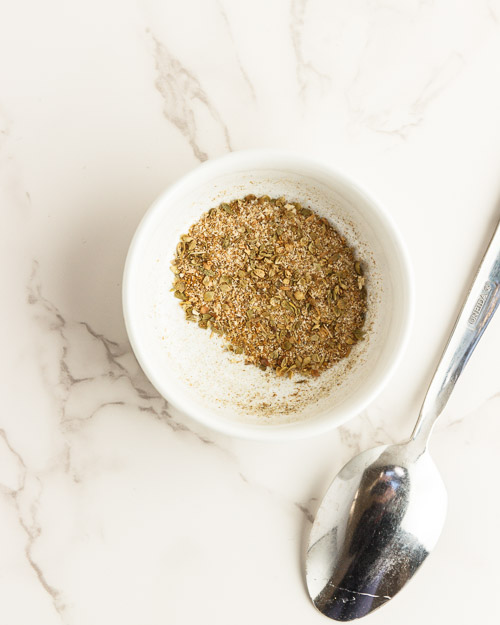 Mixing the Cuban spices.