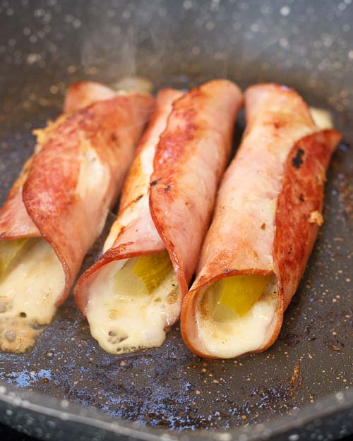 Flipping the rolls over.