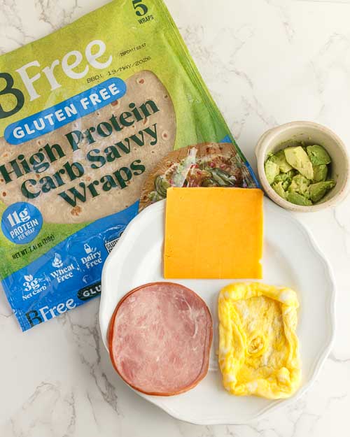 The ingredients to make breakfast tortilla wraps.