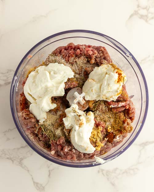 Processing the ingredients in a food processor.