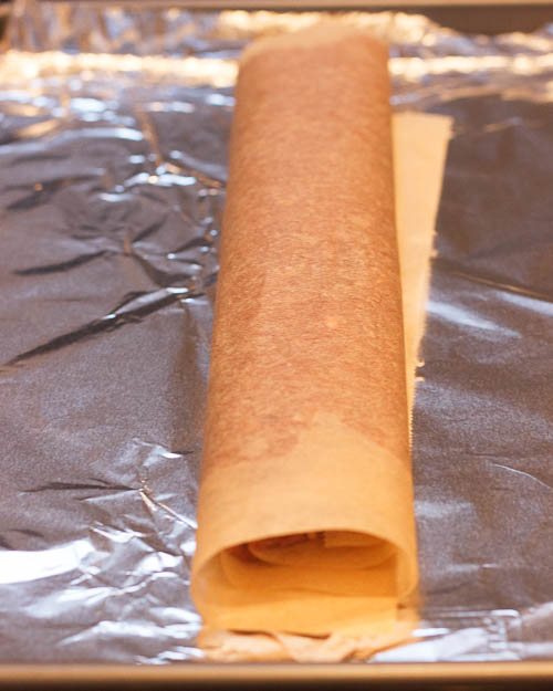 Place the meat roll onto a prepared baking sheet.