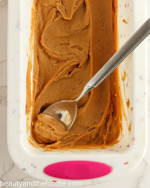 Rolling caramel into balls.